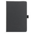 A black, hard cover notebook made from recycled leather with a ribbon closure. Features a logo on the cover.