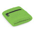 A green wrist sweat band with a black zippered pocket, featuring a textured fabric design.