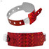 A red holographic wristband featuring a diamond pattern, secured with a white plastic fastener.