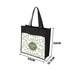 A black non-woven tote bag featuring a leaf pattern. Dimensions are 33cm x 33cm x 12.7cm. Includes a logo.