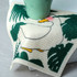 A biodegradable dishwashing cloth featuring a duck design among green foliage, predominantly in white with colourful accents.