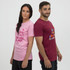 A unisex T-shirt in pink worn by a female model and a maroon T-shirt worn by a male model, both featuring text and a logo.
