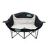 A foldable portable camping chair in black and grey, featuring a logo on the backrest and a sturdy frame.