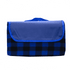 A picnic blanket in blue and black check pattern, featuring a blue flap and a carrying handle.