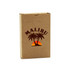 A tan cardboard box containing eco-friendly playing cards with a logo featuring palm trees and a sunset.