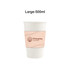 A 500ml white compostable paper cup with a light pink cup sleeve featuring a logo.