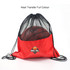 A red drawstring mesh backpack with a basketball partially visible inside. The bag features a logo.