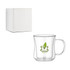 A double wall glass mug with a clear body and handle, packaged in a white box. It features a green logo.