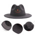 A black felt wide brim fedora hat with a decorative logo on the front and close-up views of its details.