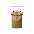 A vintage roll top backpack in khaki, featuring a logo and side zip pockets.