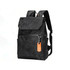 A black camo-patterned laptop backpack with two shoulder straps and an orange accent. It features multiple pockets and a front flap.
