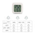 A square white thermometer displays temperature and humidity readings on a digital screen, with a logo present.