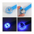 A blue LED pet collar light with a circular design and USB-C charging port. It emits a bright blue light.