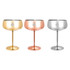 A set of three stainless steel cocktail coupes in gold, rose gold, and silver finishes, each with a pedestal base.