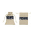 Cotton linen patchwork drawstring bags in natural and navy blue floral designs. Features a tie closure and branding.