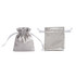 Two silver silk satin drawstring bags, one standing upright and the other lying flat, both featuring white drawstrings.