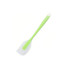 A silicone spatula with a white head and a green handle, featuring a hanging hole for easy storage.