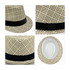 A breathable woven straw hat in tan and white with a black band, featuring a textured pattern and a smooth interior.