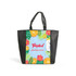 A tote bag featuring a vibrant tropical design with flowers, fruits, and a bird, complemented by black handles.