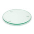 A round, transparent glass coaster with three small feet for stability.