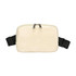A cream polyurethane fanny pack with a zippered closure and adjustable black straps. It features a logo on the surface.