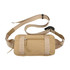 A beige travel fanny pack with a zippered front pocket and an adjustable strap. It features a simple logo.