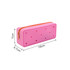 A pink silicone pencil case with cut-out heart shapes and a zipper closure, measuring 18 cm by 7 cm by 4.7 cm.
