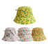 Four RPET bucket hats in yellow with green patterns, grey with abstract designs, white with colourful stars, and orange with vibrant motifs.