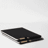 A black A4 notebook stacked with a pen, featuring a simple design and a logo on the cover.