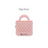 A pink mini EVA bag clip with a handle and perforated design, featuring a logo on the base.