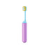 A foldable toothbrush with a soft bristle head in blue and a pink body, featuring a logo on the handle.