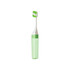 A green foldable toothbrush with a white handle, stored in a clear green case, featuring a logo.