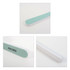 A double-sided polished nail file featuring a light green sanding surface and a white body. It has a branded logo.