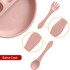 A pastel pink silicone kids suction plate with a fork and spoon, featuring a logo.