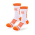 A pair of white sport socks with orange accents and stripes, featuring a logo on the upper part.