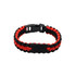A red and black paracord bracelet featuring a metal plate and a buckle clasp, with a simple woven design.