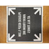 A square black iron-on transfer with white text and directional arrows. Suitable for custom fabric applications.