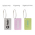 Brushed aluminium luggage tags in silver, pink, and green with various print styles and metal loops.