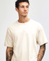 A heavyweight cotton unisex T-shirt in cream, featuring a simple design and a slight stretch fit.
