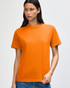 An orange heavyweight cotton unisex T-shirt displayed on a model with a neutral background.
