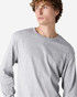 A lightweight, unisex long sleeve T-shirt in grey, featuring a round neckline and a subtle logo.