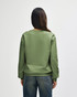 A back view of a green Gildan Heavy Blend Adult Crewneck Sweatshirt with a logo on the side.