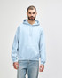 A light blue hooded sweatshirt with a front pocket and drawstring. It features a logo on the side.