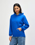 A blue hooded sweatshirt with a front pocket and drawstring hood, worn by a standing model. The sweatshirt has a logo.
