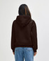 A brown hooded sweatshirt viewed from the back, featuring a kangaroo pocket and a branded label.