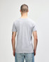 A grey Gildan Softstyle adult v-neck t-shirt displayed from the back, featuring a plain design and a logo.