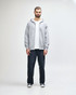 A grey full zip hooded sweatshirt featuring a front pocket and a hood. It has a logo on the side.