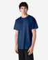 A model wearing a navy blue Gildan Ultra Cotton adult T-shirt. The shirt has a logo on it.