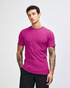 A unisex fine jersey short sleeve t-shirt in a vibrant purple colour, displayed on a model. It features a branding logo.