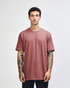 A unisex fine jersey short sleeve t-shirt in a pink colour, featuring a simple design and a logo on the front.